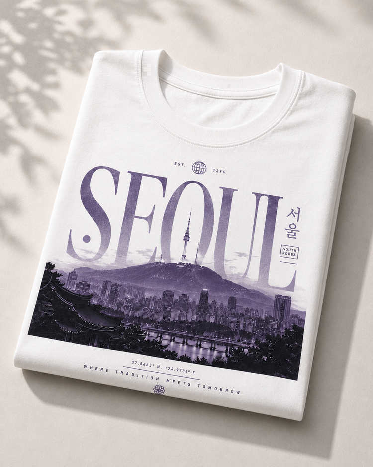 White t-shirt with 'SEOUL' design featuring a cityscape and mountain.