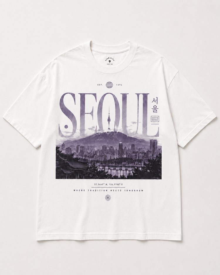 White t-shirt with a graphic of a cityscape and 'SEOUL' text on a light gray background