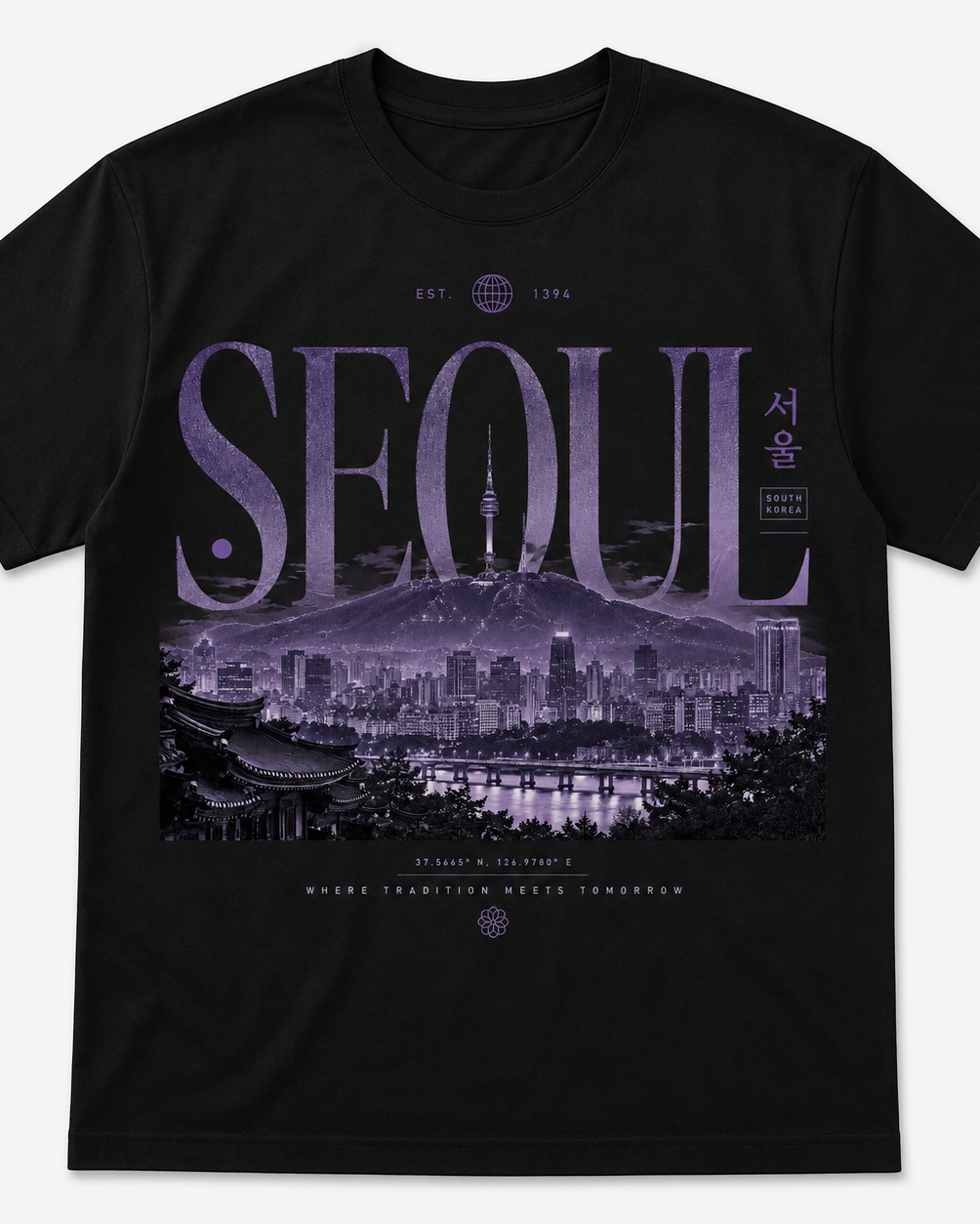 A black short-sleeve crewneck t-shirt featuring a large graphic print of the Seoul skyline in purple tones, with the word &
